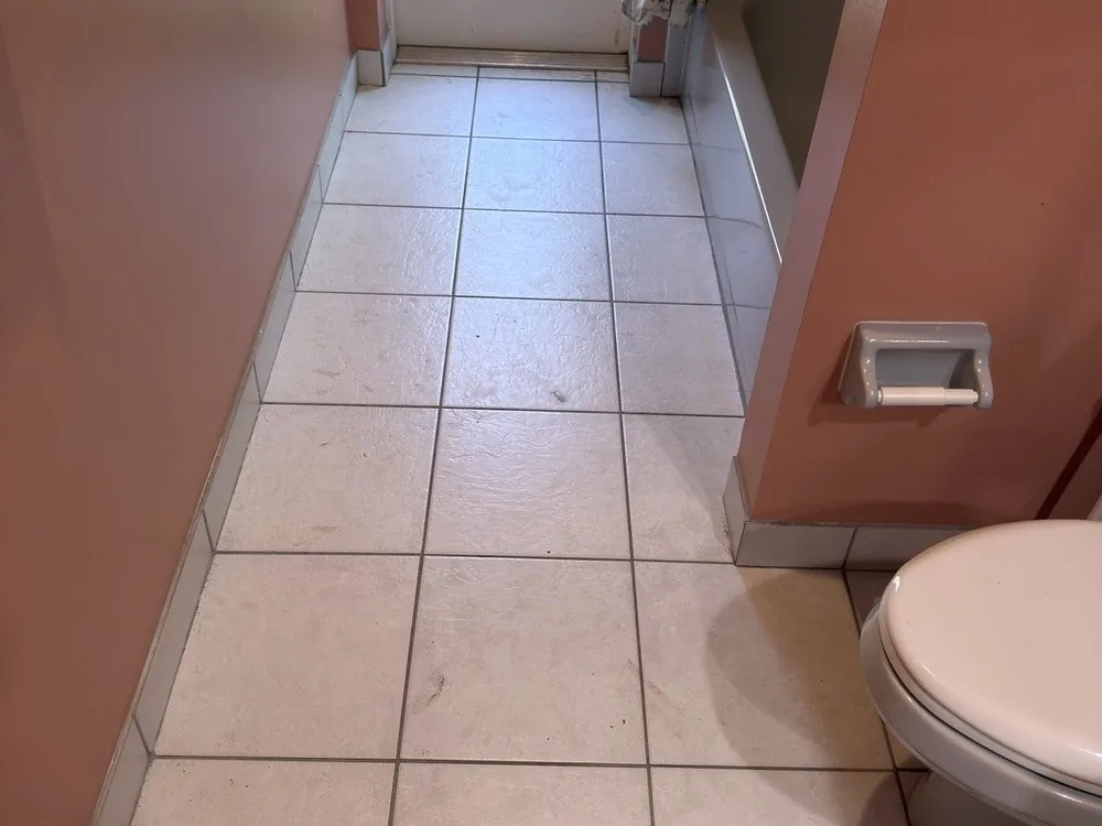 Bathroom floor before cleaning by Ocean View, Stuart FL
